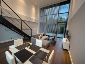 Luxury loft con jardín cerca del aeropuerto